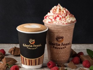 The acquisition includes 800 franchised outlets across 40 countries, as well as a wholesale coffee business.